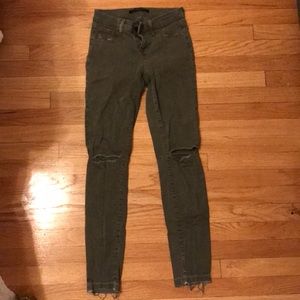 Military green distressed jeans